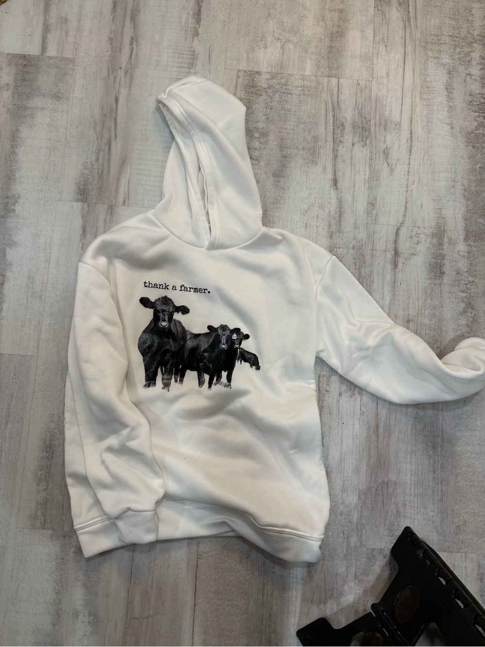 White light weight Hoodie with Black Cow Graphic - "thank a farmer."